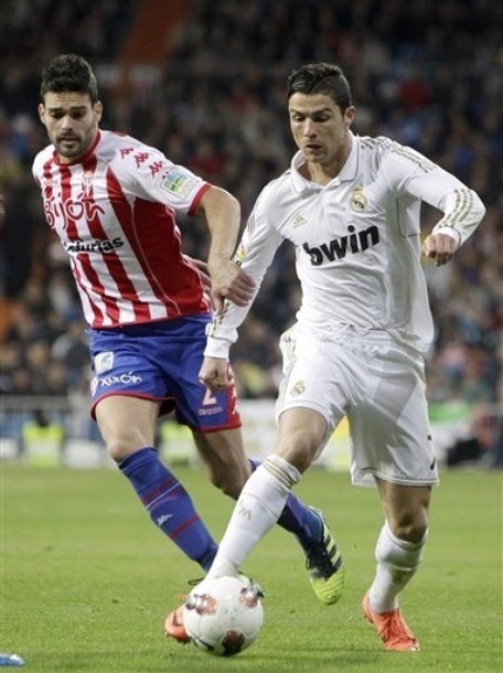 Gambar Foto Cristiano Ronaldo di Liga Spanyol Melawan Sporting Gijon