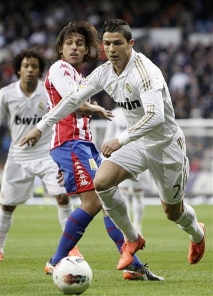 Gambar Foto Cristiano Ronaldo di Liga Spanyol Melawan Sporting Gijon