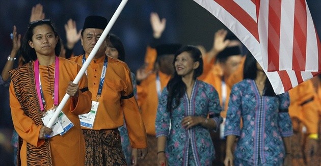Gambar Foto Delegasi Malaysia Kenakan Ban Lengan Warna Hitam