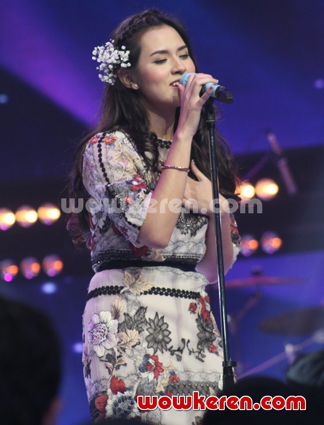 Gambar Foto Raisa Tampil Memukau di Konser 'Music of the Day'