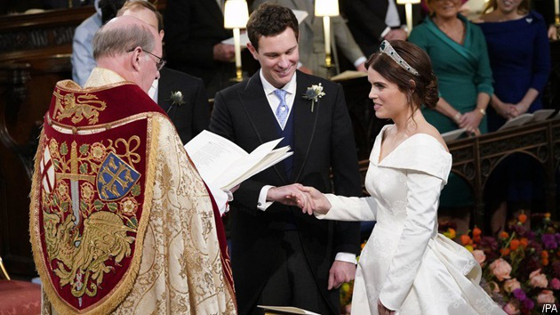 Gambar Foto Jack Brooksbank dan Putri Eugenie mengucap janji pernikahan.