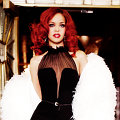 Rihanna dalam balutan busana Yves Saint Laurent di majalah Glamour