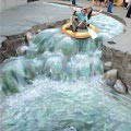 Rafting di sungai karya Julian Beever