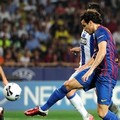 Cesc Fabregas saat mencetak gol kedua bagi Barcelona