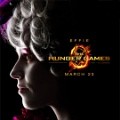 Elizabeth Banks berperan sebagai Effie Trinket