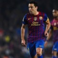 Xavi Hernandez di La Liga Match FC Barcelona and Sporting Gijon
