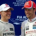 Jenson Button dan Michael Schumacher di Malaysia F1 Grand Pix