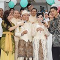 Pelepasan Sepasang Burung Merpati oleh Kedua Mempelai