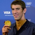 Atlet Renang Amerika, Michael Phelps, Mendapatkan Medali Emas