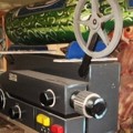 Peti Jenazah Berbentuk Proyektor Film