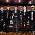 Super Junior Raih Trofi Disk Daesang