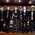 Super Junior Raih Trofi Disk Daesang