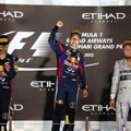 Mark Webber, Sebastian Vettel dan Nico Rosberg Saat Berada di Podium Juara