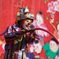 Penampilan Seorang Badut di 'Spring Festival Temple Fair'