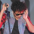 Giring Nidji Saat Tampil di Acara 40 Tahun Guinness Indonesia