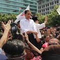 Jokowi dan Jusuf Kalla Saat Diarak Menuju Istana Merdeka