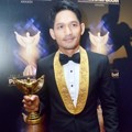 Ibnu Jamil Raih Piala Host Sport Program