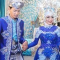 Fedi Nuril Gandeng Mesra Vanny Widyastati Saat Resepsi