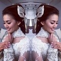 Asty Ananta Kenakan Kebaya Rancangan Raden Sirait