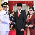 Anies Baswedan dan Presiden Jokowi menyempatkan diri untuk bertatap muka.