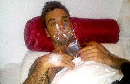Robbie Williams Keracunan Makanan