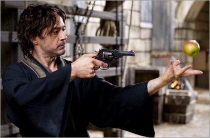 Robert Downey Jr. Mainkan Pistol di Foto Terbaru 'Sherlock Holmes: A Game of Shadows'