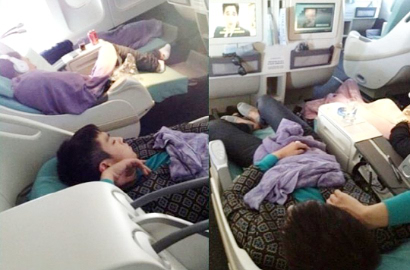 Netizen Marah Fans Diam-Diam Motret T.O.P Tidur di Pesawat