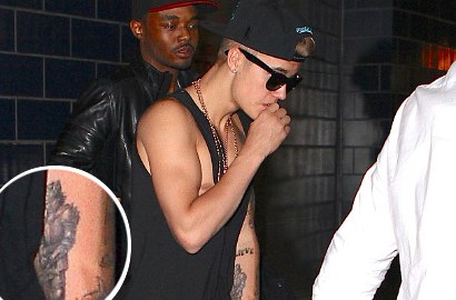 Justin Bieber Buat Tato Gambar Ksatria untuk Selena Gomez?