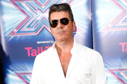 Simon Cowell Malas Gantikan Popok Tapi Ingin Tambah Anak