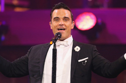 Bosan Menyanyi, Robbie Williams Pilih Bekerja di Borrusia Dortmund?