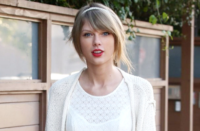 Taylor Swift Tanggapi Video Kocak Polisi Nyanyikan 'Shake It Off'