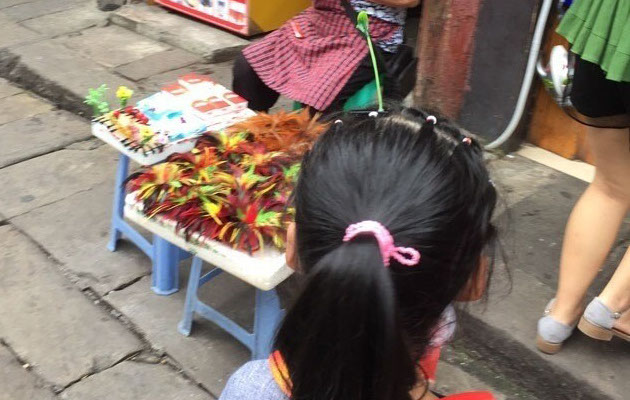 Tunas Bunga 'Tumbuh' di Kepala Orang-orang Beijing, Kok Bisa?