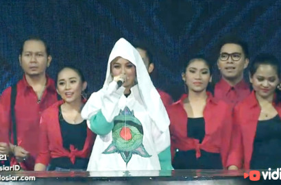 Agnes Monica Pakai Kostum Tulisan Arab di HUT Indosiar, Ternyata Ini Artinya