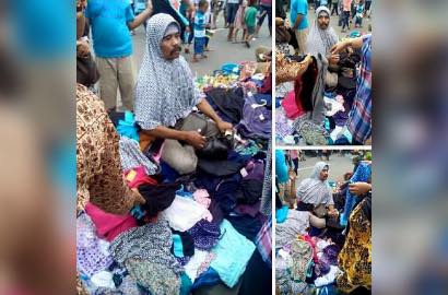 Jualan Sambil Kenakan Hijab, Kumis Bapak Ini Bikin Netter Salah Fokus