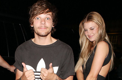 Unggah Foto Bareng, Louis Tomlinson Peluk Manja Anak Pertama