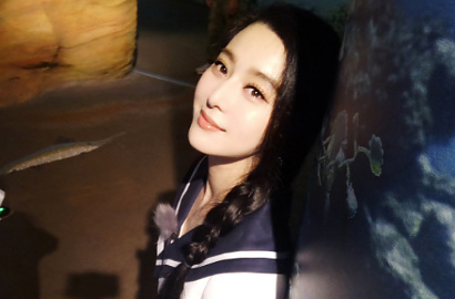 Foto Fan Bingbing Cium 'Mesra' Paus Beluga di Acara TV Tuai Kritikan, Kenapa?