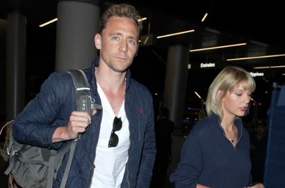 Netter Kasihan Tom Hiddleston Terjebak 'Perang' Taylor Swift vs Kim K