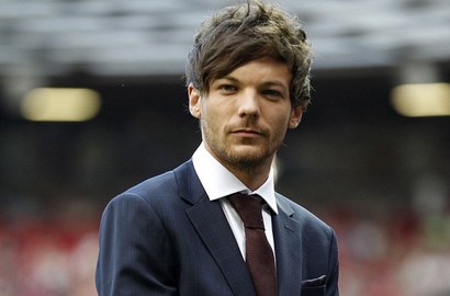 Louis Tomlinson Mulai Ingin Ajari Bayinya Main Gitar?