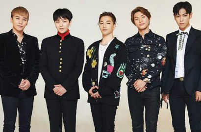 Bangga, Taeyang Pamerkan Foto Big Bang Diwawancara CNN