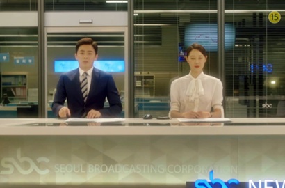 Gong Hyo Jin-Jo Jung Suk Kompak Jadi Pembaca Berita di 'Incarnation of Envy'