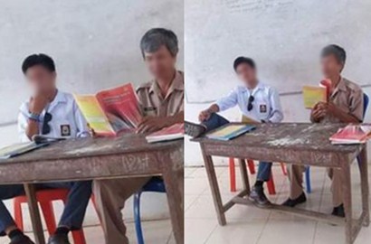 Netter Heboh, Beredar Foto Murid Merokok Sambil Angkat Kaki di Sebelah Guru