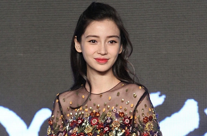 Angelababy Temani Suami Kerja, Fans Salah Fokus ke Merek Baju G-Dragon