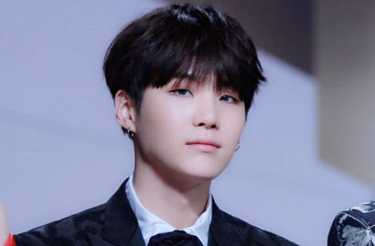 Sakit Telinga, Suga Bakal Absen Dari Penampilan BTS di Akhir Tahun