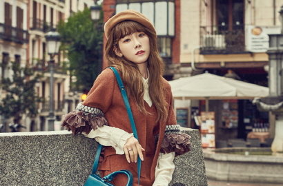 Cantik dengan Dress dan Rok, Intip Gaya Feminin Tae Yeon di Madrid Ini
