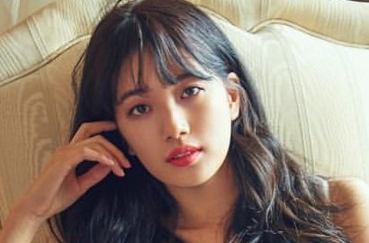 Usai Diisukan Gelar Pesta dengan Lee Min Ho, Suzy Tampil Ceria di Bandara