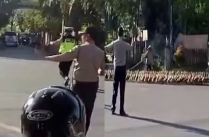 Bantu Bebek-Bebek Nyeberang Jalan Raya, Wakapolresta Solo Tuai Pujian