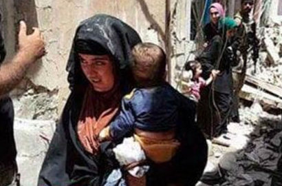 Miris, Beredar Foto Pelaku Bom Bunuh Diri ISIS Bawa Bayi Sebelum Meledakkan Diri