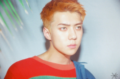 Berambut Oranye, Senyum Tipis Sehun di Teaser Comeback EXO Bikin Meleleh