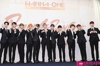Muncul Perdana Usai Kontroversi, Wanna One Bungkukkan Badan di Bandara