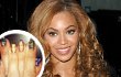 Beyonce Knowles Pamer Hias Kuku dengan Foto Diri dan Jay-Z